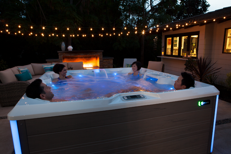 hot tub wellness, relaxing in a hot tub, wellness benefits of spas, mental wellness, mental health, emotional wellness