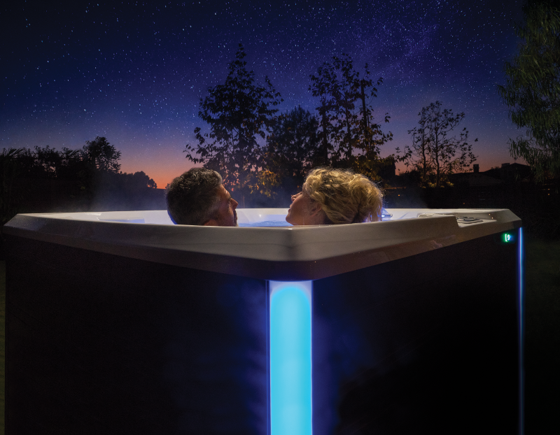 hot tub wellness, relaxing in a hot tub, wellness benefits of spas, mental wellness, mental health, emotional wellness