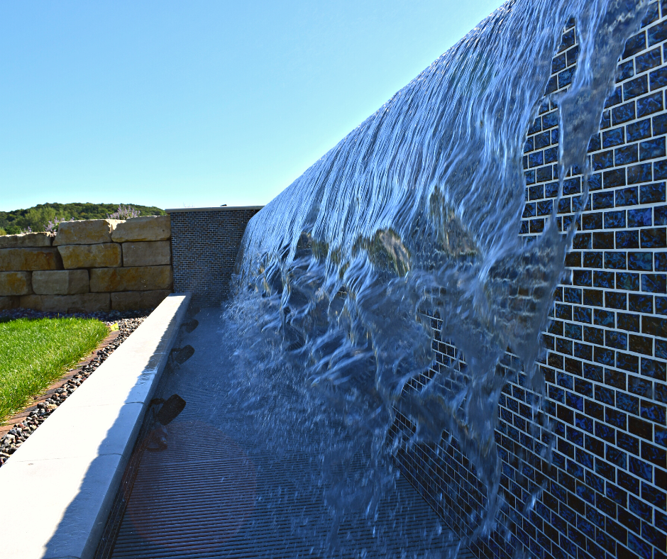 close up view of fountain by pool